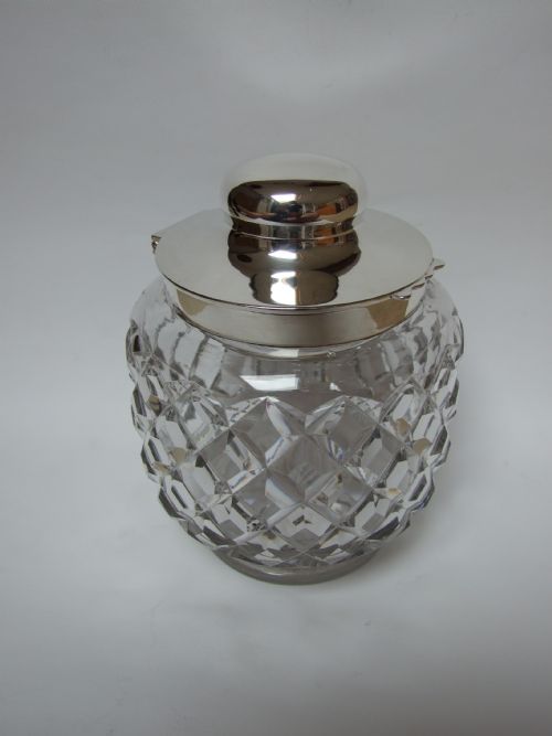 An Extremely Rare Silver Mounted Biscuit Box by Hukin & Heath.