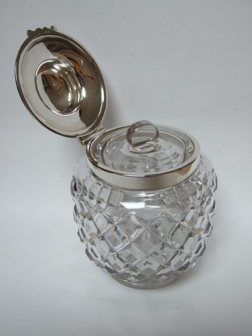 fig 1. An extremely rare silver mounted biscuit box by Hukin & Heath.