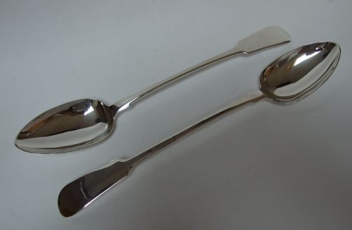 A Stunning Pair of Georgian Newcastle Silver Stuffing Spoons.