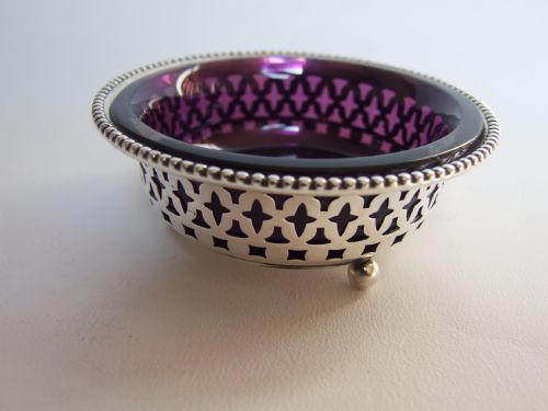 An American Sterling Silver and Amethyst Glass Dish.