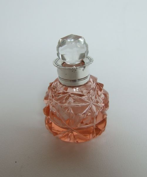 A Victorian Silver Collared Perfume Bottle.