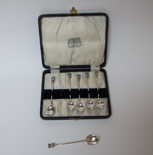 A Rare Boxed Set of Silver 'Lincoln Imp' Coffee Spoons.