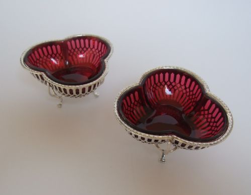 A Gorgeous Pair of Pierced Silver Dishes with Cranberry Liners. Mappin & Webb.
