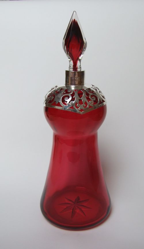 A Truly Magnificent Silver Mounted Cranberry Decanter.