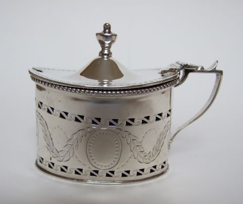 A Splendind Victorian Adams Style Silver Mustard Pot.