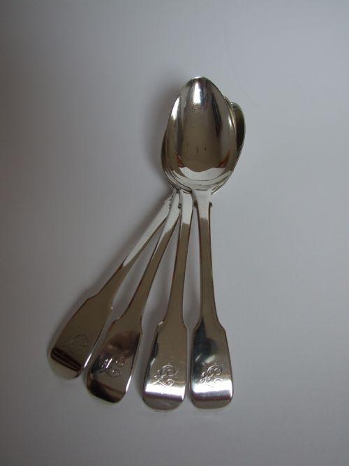 A Rare Set of Four George IV Silver Serving Spoons.