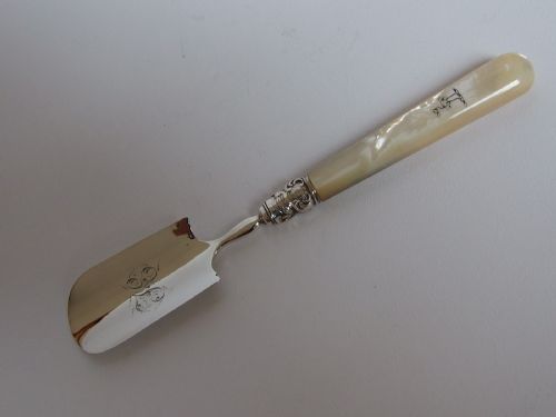 A Good Georgian Silver Stilton Scoop.