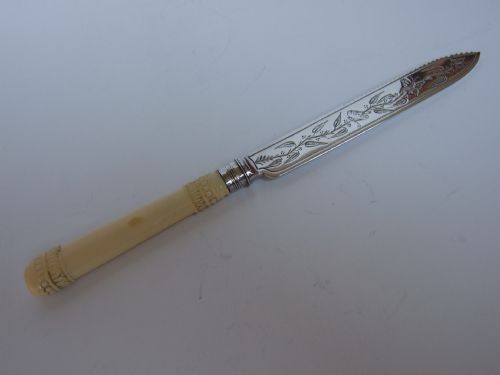 A Rare Victorian Butterfly Engraved Silver Cakeknife.