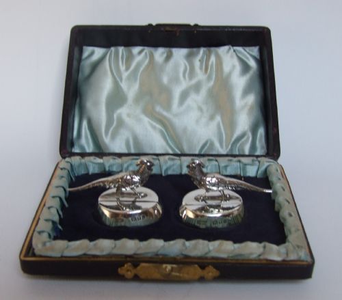 A Rare Pair of Samson Morden Boxed Silver Menu Holders in the Form of Game Birds.