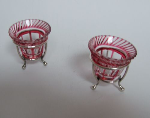 An Unusal Pair of Victorian Silver and Cranberry Salt Tubs.