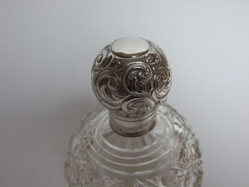 fig 1. A beautiful Edwardian silver topped cologne bottle.
