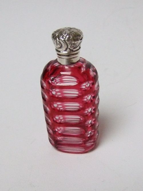 An Attractive Victorian Silver Mounted Cranberry Perfume Bottle.