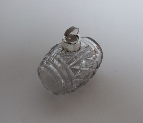 A Lovely Miniature 'Keg' Perfume Bottle with Silver Collar.