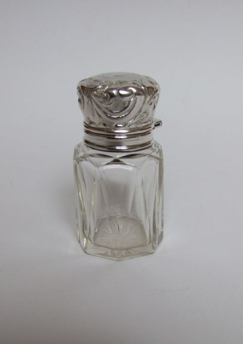 A Lovely Edwardian Silver Mounted Perfume Bottle.