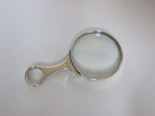 fig 1. A rare hallmarked silver magnifying glass.