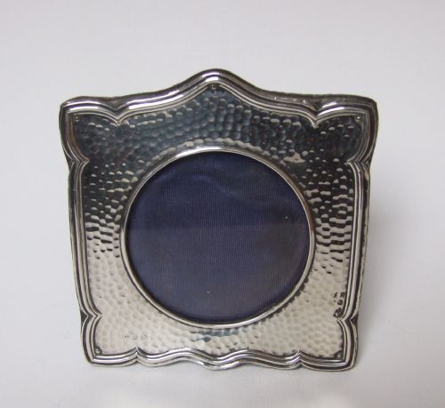 A Delightful Arts & Crafts Hammered Silver Photo Frame.