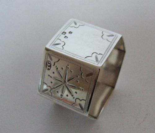 A Superior Victorian Hexagonal Silver Napkin Ring.