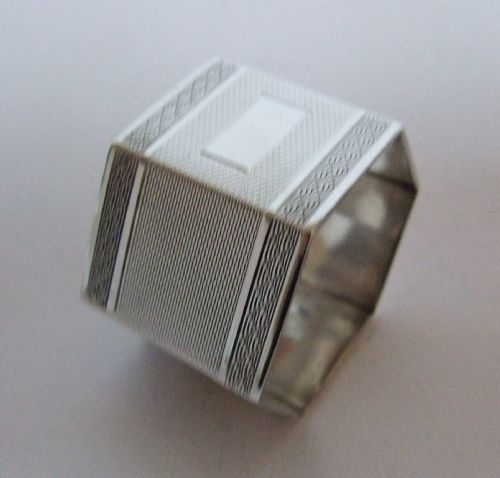 A Stunning Art Deco Silver Napkin Ring.