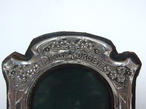 fig 1. A touching Art Nouveau silver photo frame. 'Dinna Forget'.