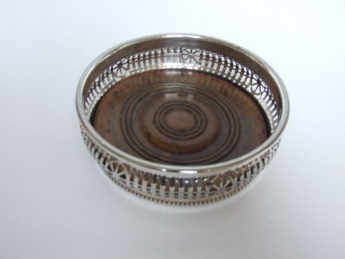 A French Retailed Silver Plated Wine Bottle Coaster.