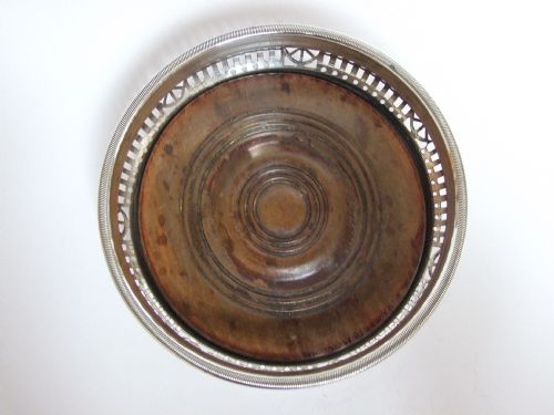 fig 1. A French retailed silver plated wine bottle coaster.