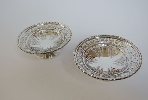 A Superb Pair of Pierced Silver Bonbon Dishes.