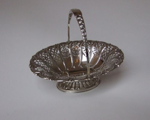 A Splendid Victorian Pierced Silver Sweetmeat Basket.