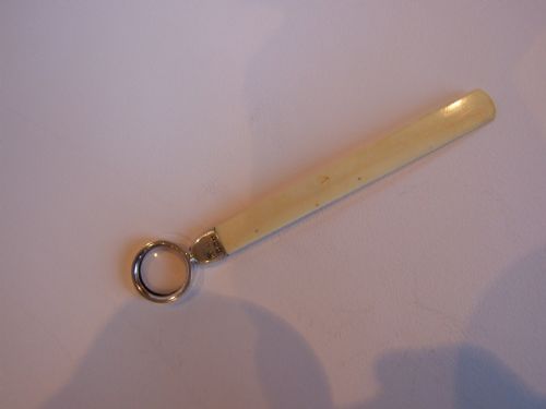 A Rare Silver and Ivory Bookmark and Magnifying Glass.