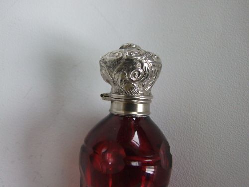 fig 1. A Victorian silver mounted cranberry 'icicle' perfume bottle.