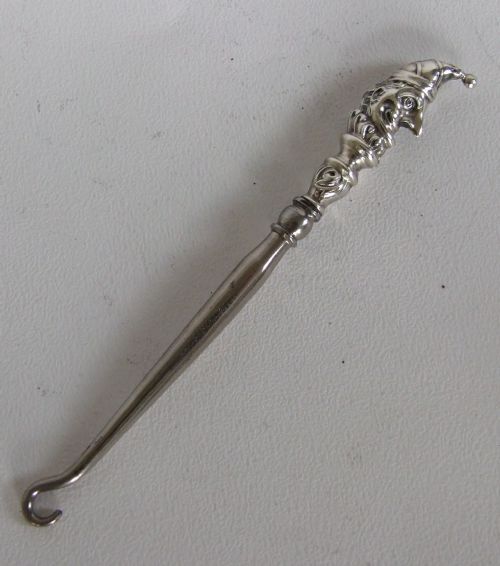 An Extremely Rare Edwardian Silver Mr.punch Button Hook.