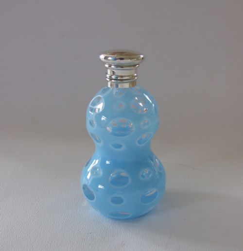 A Rare Victorian Aqua Blue Perfume Bottle with Silver Hinged Lid.