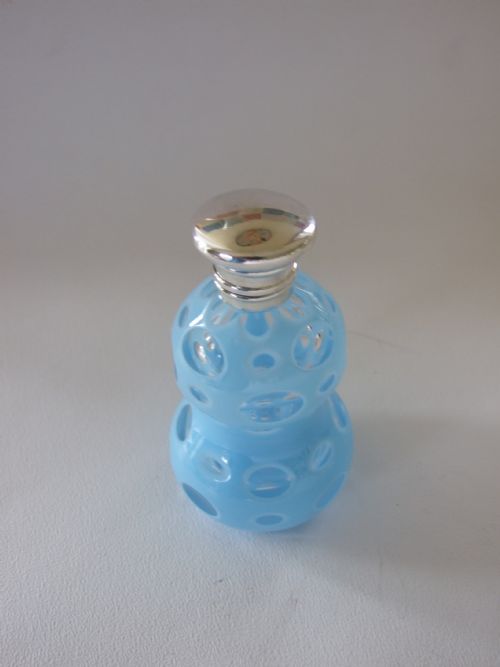 fig 1. A rare Victorian aqua blue perfume bottle with silver hinged lid. 