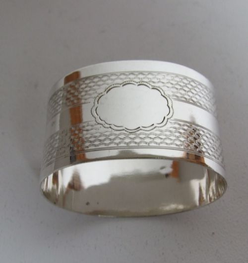 An Attractive George V Engine Turned Silver Napkin Ring.