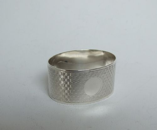 A Stylish Art Deco Oval Silver Napkin Ring.