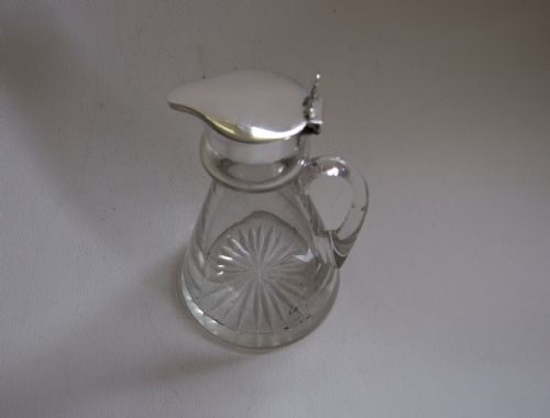fig 1. A silver mounted chotopeg or whisky tot.