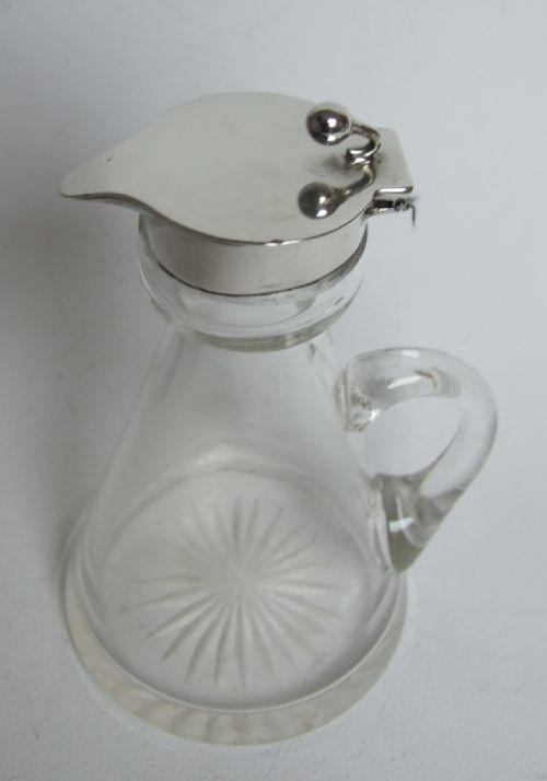 fig 1. Unusual silver mounted chotopeg or whisky tot.