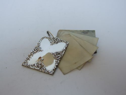 A Victorian Silver and Ivory Aide Memoire.