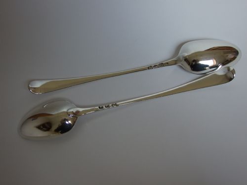 fig 1. A spectacular pair of 18th Century silver stuffing/basting spoons.