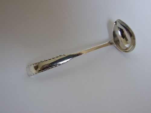 A Rare Georg Jensen Silver Cream Ladle.
