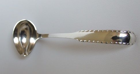 fig 1. A rare Georg Jensen silver cream ladle.