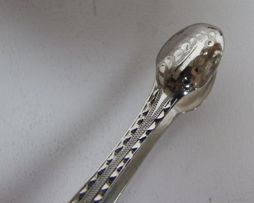 fig 1. A lovely pair of Exeter silver tongs.