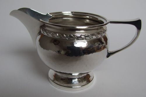 A Superb Arts & Crafts Silver Cream Jug by Connell's of Cheapside.