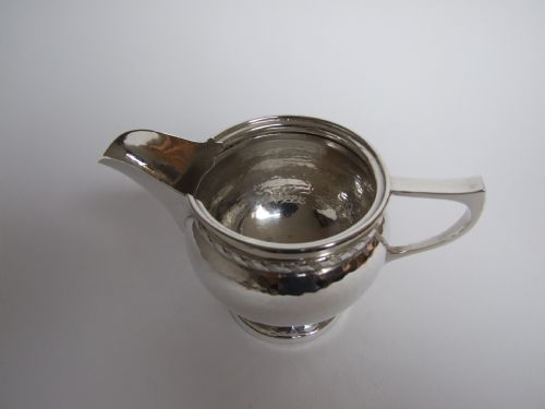 fig 1. A superb Arts & Crafts silver cream jug by Connell's of Cheapside.