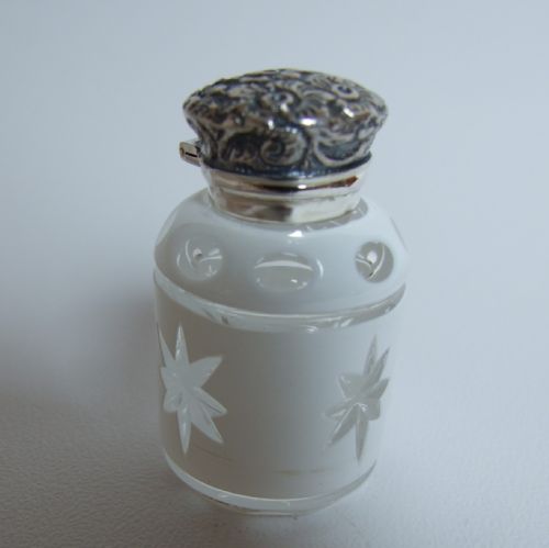 An Unusual Victorian Silver Mounted Perfume Bottle.