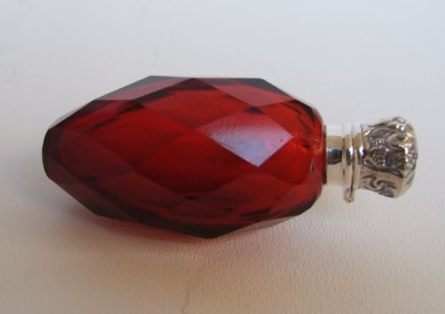 A Lovely Victorian Silver Mounted Scent Bottle with Ruby Glass Body.