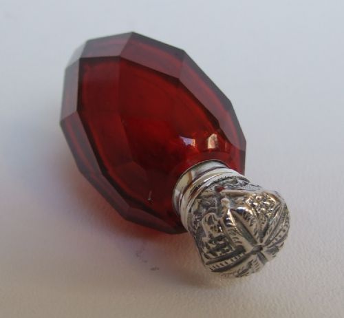 fig 1. A lovely Victorian silver mounted scent bottle with ruby glass body.