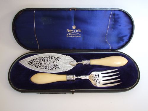 A Superb Victorian Boxed Pair of Pierced Fish Servers.
