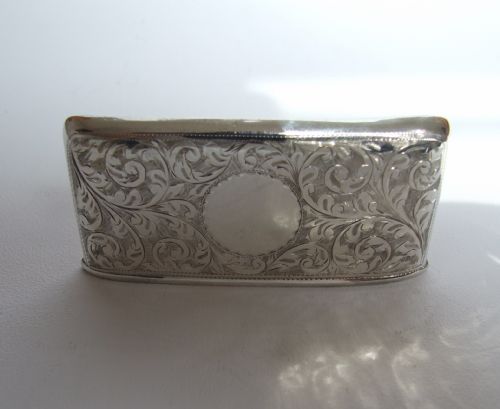 fig 1. A handsome silver gilt card case.