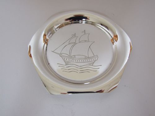 fig 1. An unusual silver trinket dish engraved with a sailing ship.