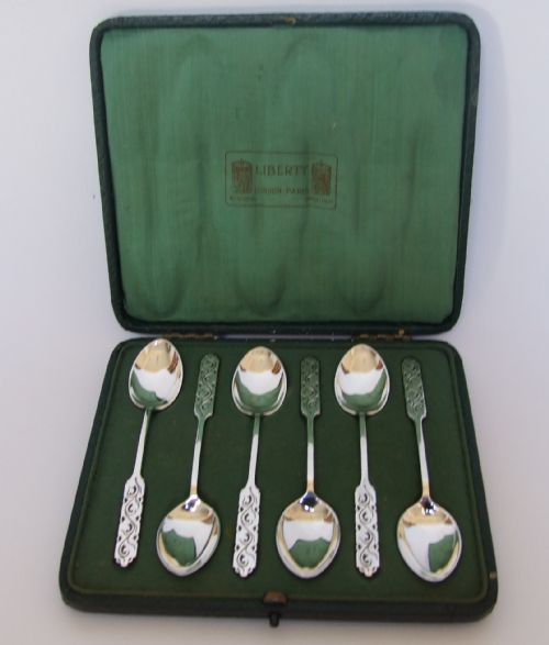 An Extremely Rare Liberty & Co. Set of Six Silver Coffee Spoons in the Original Box.